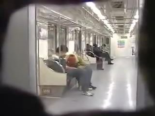 Jap pareja público golpe en tren