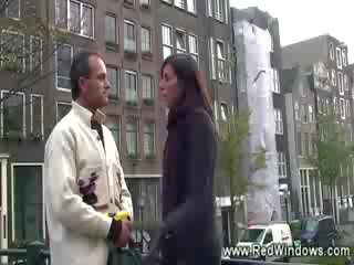 With his guide horny tourist visits a prostitute in Amsterdam