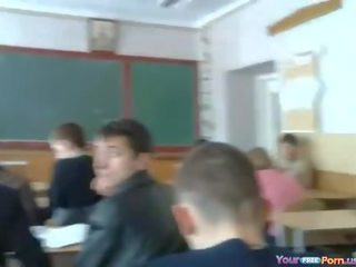 Brunette Slut Jerking Off A Guy In Class