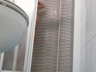 Spying on erotic Wife Shaving Pussy in Shower